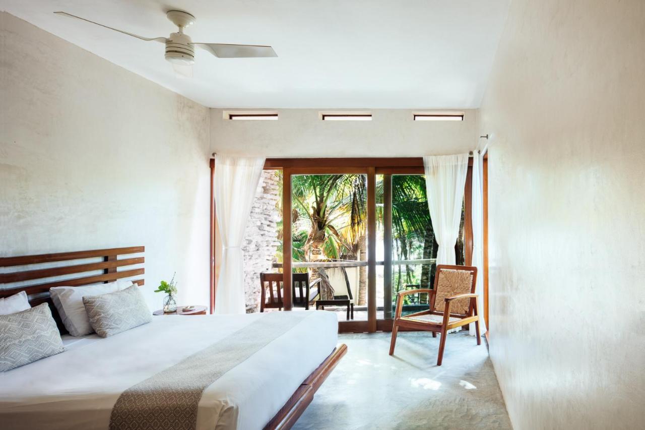 Quarto com Cama King-size e Vista do Mar